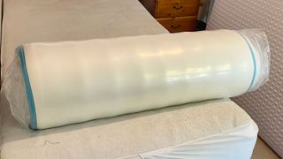 Rolled-up Linenspa Memory Foam Hybrid mattress