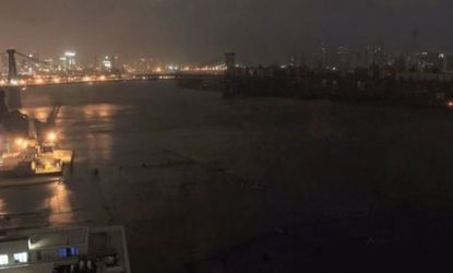 A view from Northside Piers in Williamsburg, Brooklyn shows Manhattan just after power was lost.