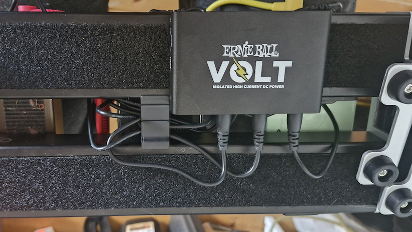 The underside of the D’Addario XPND 1 showing my Ernie Ball Volt power supply mounted