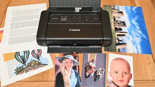 Canon Pixma TR150 compact mobile inkjet printer with example prints