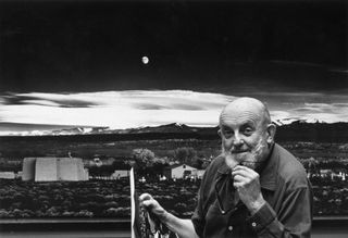 50 best photographers ever: Ansel Adams in front of his picture Moonrise, Hernandez, New Mexico