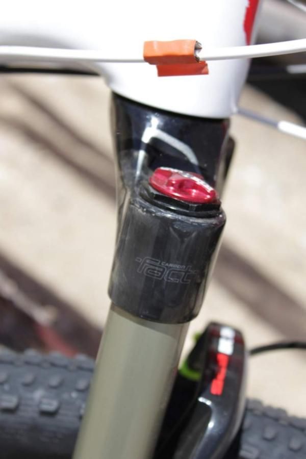 Wells has a SRAM master link taped to his front derailleur housing.