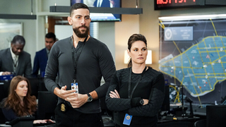 Special agent Omar Adom ‘OA’ Zidan (Zeeko Zaki) and special agent Maggie Bell (Missy Peregrym) look tense in an office in FBI season 6