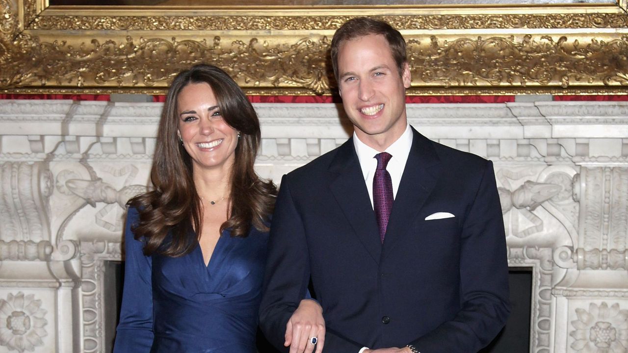 Prince William and Kate Middleton pose for photographs after the news of their engagement in 2010