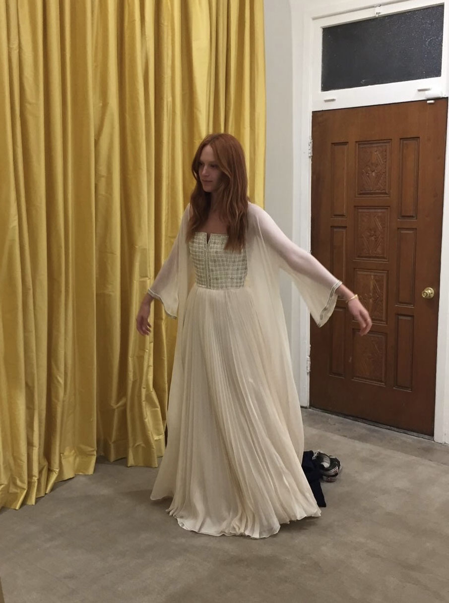 Woman in vintage wedding dress.