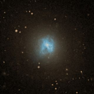 NGC5044, a “red and dead” galaxy like ALESS65 will become in about 25 million years. (the X-Rays are shown in blue and the visible light is shown in yellow).