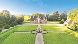 Stone and oak grand manoir surrounded by landscaped gardens