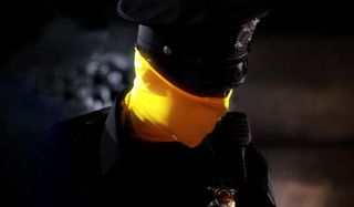 Watchmen a masked police officer on patrol
