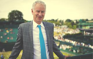 John McEnroe enjoys his commentary job at Wimbledon.