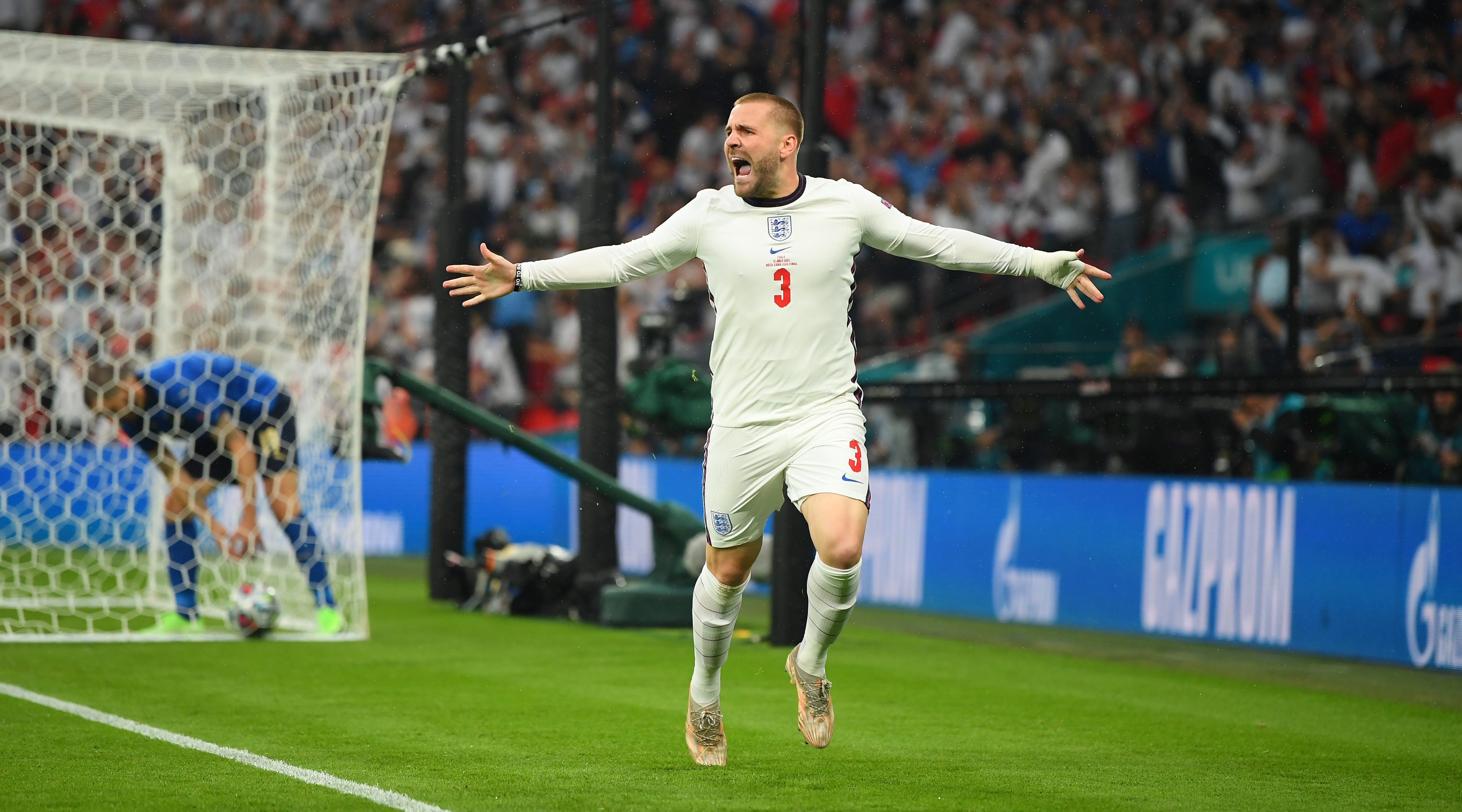 LONDON, ENGLAND - JULY 11: Luke Shaw of England celebrates scoring the first goal during the UEFA Euro 2020 Championship Final between Italy and England at Wembley Stadium on July 11, 2021 in London, England.