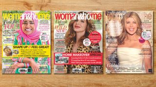 Three woman&home magazine covers from autumn/winter 2024 on a tabletop, featuring celebrity chef Nadiya Hussain, beauty and fashion mogul Trinny Woodall and TV star Kate Garraway