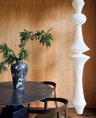 a noguchi akari light in a modern dining room