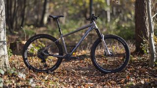 The Whyte 909 X side on in woods