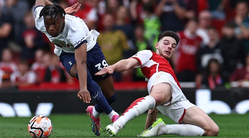 Destiny Udogie and Declan Rice challenge for the ball in the north London derby between Arsenal and Tottenham at the Emirates Stadium in September 2023.