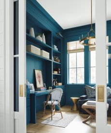 home office with teal walls