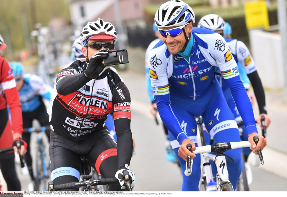 Tom Boonen smiles for the camera with cycling fan
