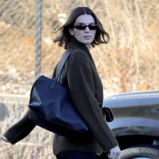 Kendall Jenner just elevated her Uggs and leggings outfit with a chic wrap cardigan. 