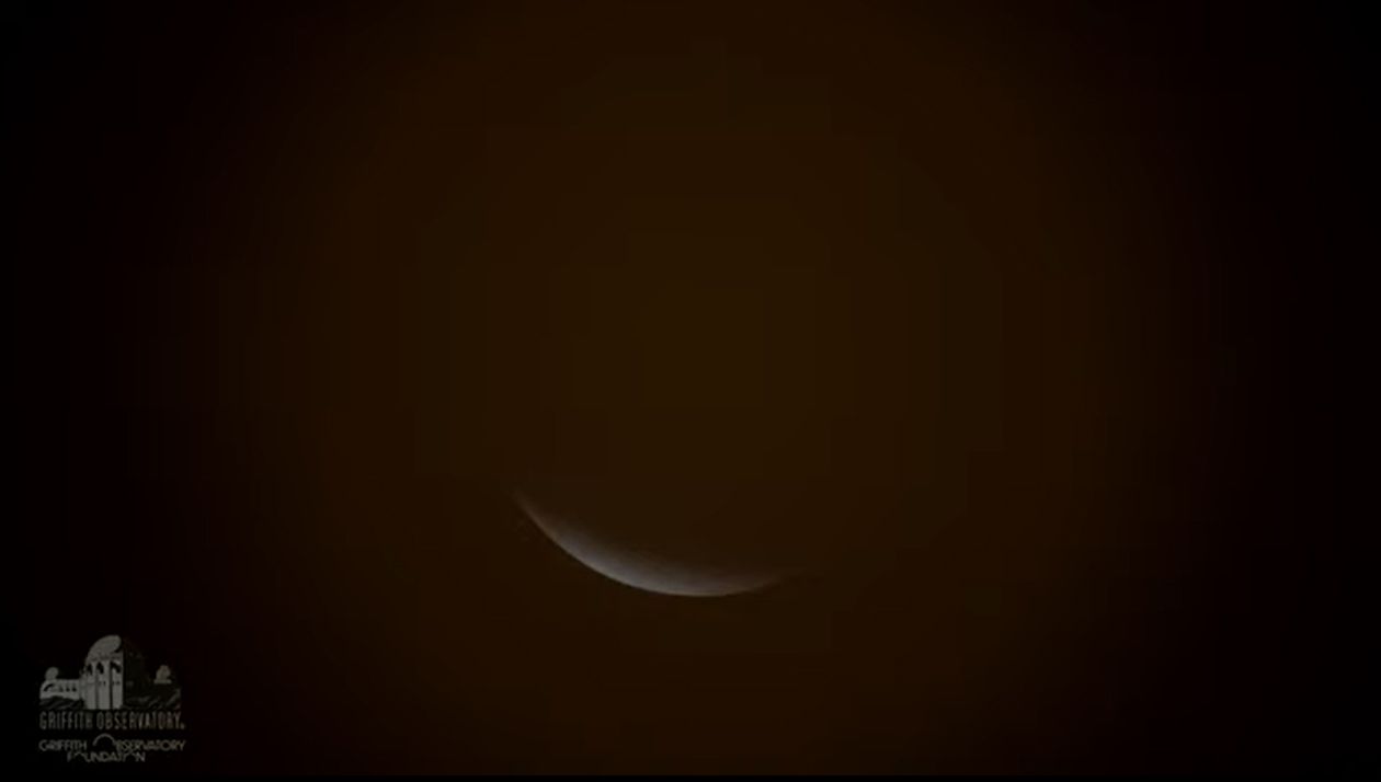 The Beaver Full Moon is nearly completely blocked by Earth's shadow during the near-total lunar eclipse of Nov. 19, 2021 as seen through a telescope from the Griffith Observatory in Los Angeles, California. The moon was 97% covered by the Earth's shadow during the longest partial lunar eclipse in 580 years.