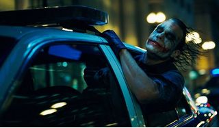 The Dark Knight Heath Ledger Joker sticks his head out into the wind