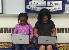 Students at Parker-Varney Elementary enjoy reading on their devices.