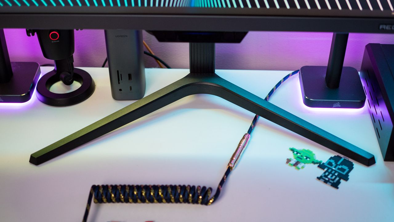 Base of the stand of the Redmagic 4K Gaming Monitor on a white table
