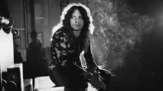 David Coverdale smoking a cigarette on a video shoot