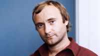 Portrait taken on September 13, 1982 shows British singer and drummer Phil Collins. Phil Collins combined his career as a drummer and singer with the band Genesis and a successful solo career.