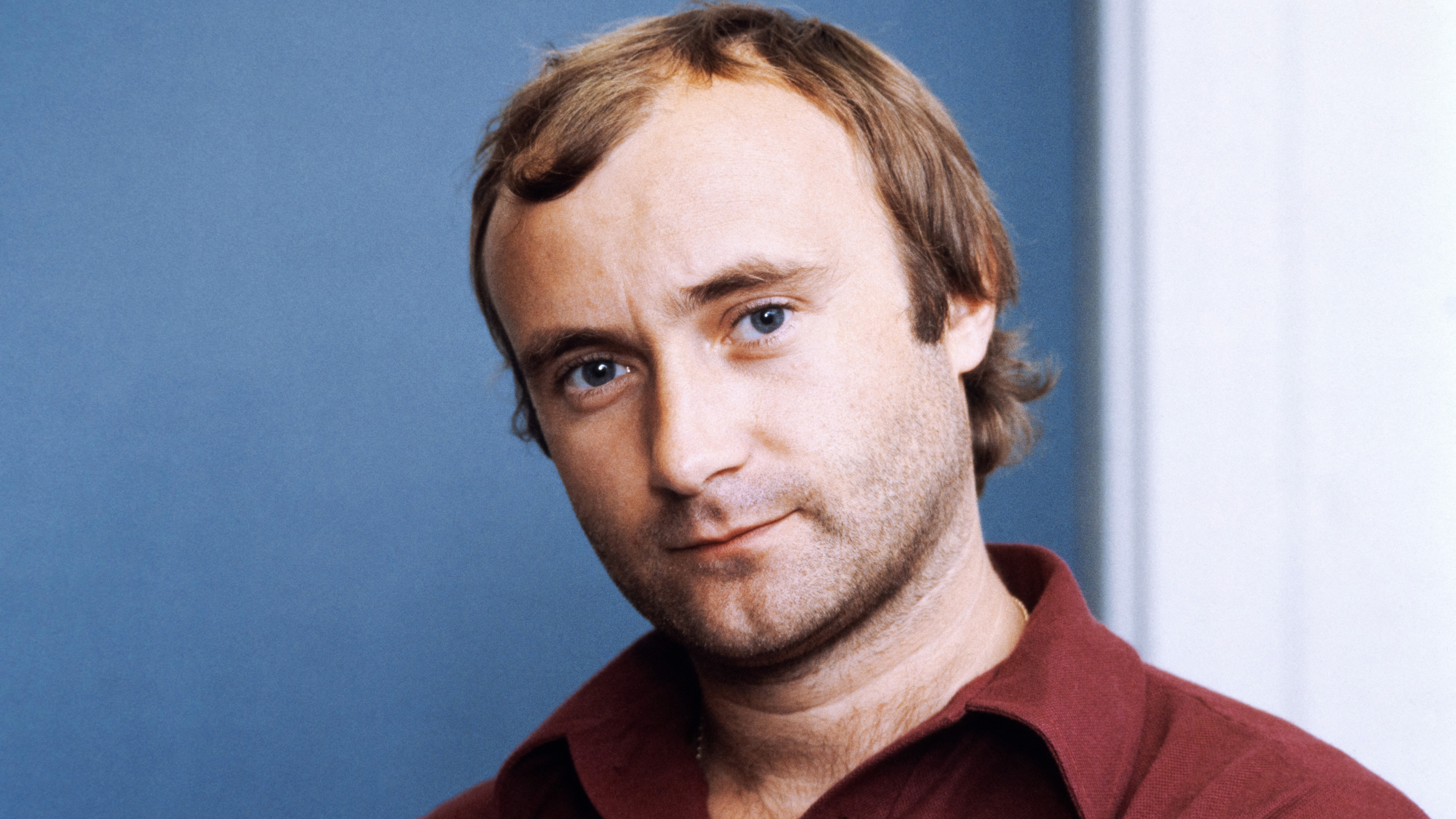 Portrait taken on September 13, 1982 shows British singer and drummer Phil Collins. Phil Collins combined his career as a drummer and singer with the band Genesis and a successful solo career.