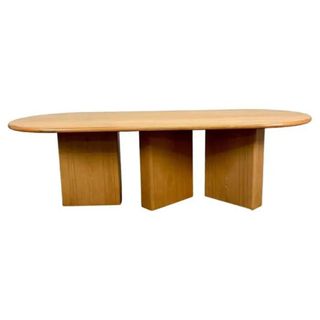 A wooden dining table from 1stDibs