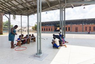 children learning in an open space