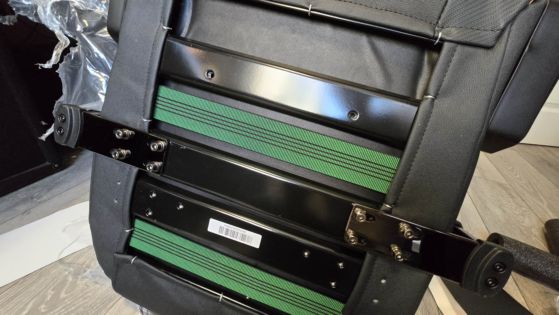 The AndaSeat Kaiser 3 XL gaming chair in an office and gaming space on a wooden floor