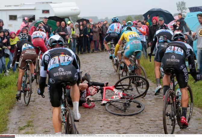 Jurgen Van Den Broeck hits the cobbles hard