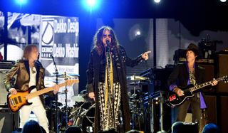 (from left) Tom Hamilton, Steven Tyler and Joe Perry perform onstage with Aerosmith at the 62nd Annual Grammy Awards at the Staples Center in Los Angeles, California on January 26, 2020