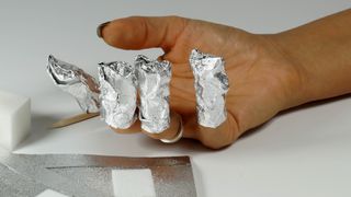 Foil wrapped around nails