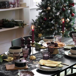 Plum hued glassware in Christmas tablescape