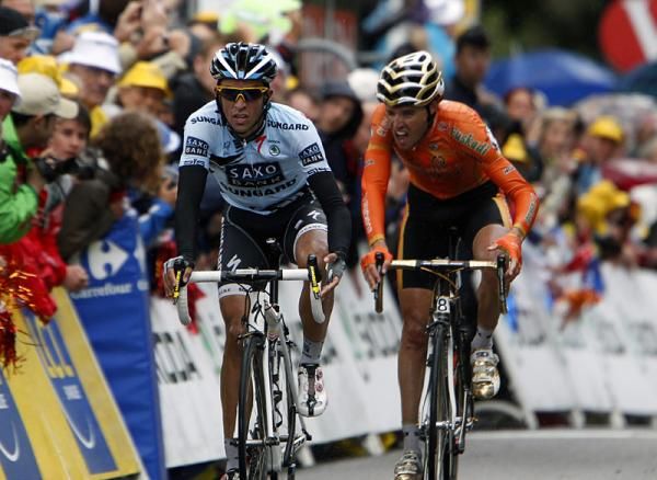 Alberto Contador leads Samuel Sanchez across the finish line in Gap.