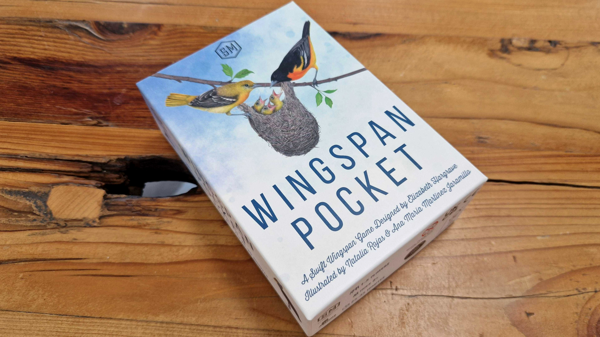 Wingspan Pocket box on a wooden table