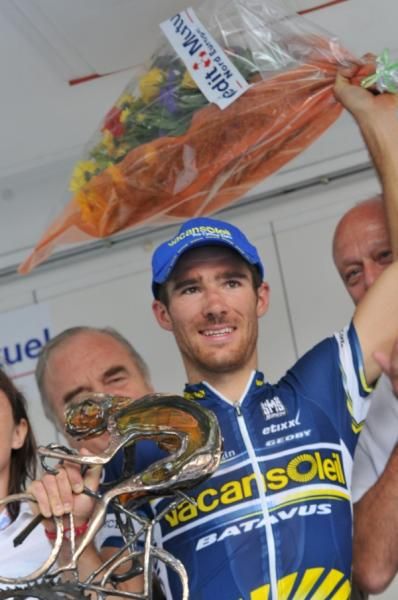 Romain Feillu (Vacansoleil Pro Cycling Team) on the podium.