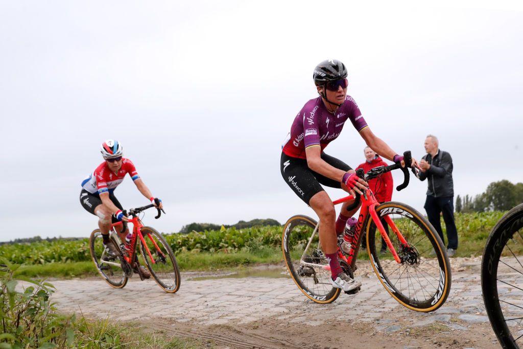 ROUBAIX FRANCE OCTOBER 02 LR Amy Pieters of Netherlands and Chantal Van Den Broek Blaak of Netherlands and Team SD Worx compete through cobblestones sector during the 1st ParisRoubaix 2021 Womens Elite a 1164km race from Denain to Roubaix ParisRoubaixFemmes ParisRoubaix on October 02 2021 in Roubaix France Photo by Bas CzerwinskiGetty Images