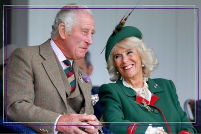 King Charles and Queen Camilla's Christmas card photo - King Charles and Queen Consort Camilla laugh with each other as they attend the Braemar Highland Gathering at The Princess Royal and Duke of Fife Memorial Park on September 3, 2022 in Braemar, Scotland