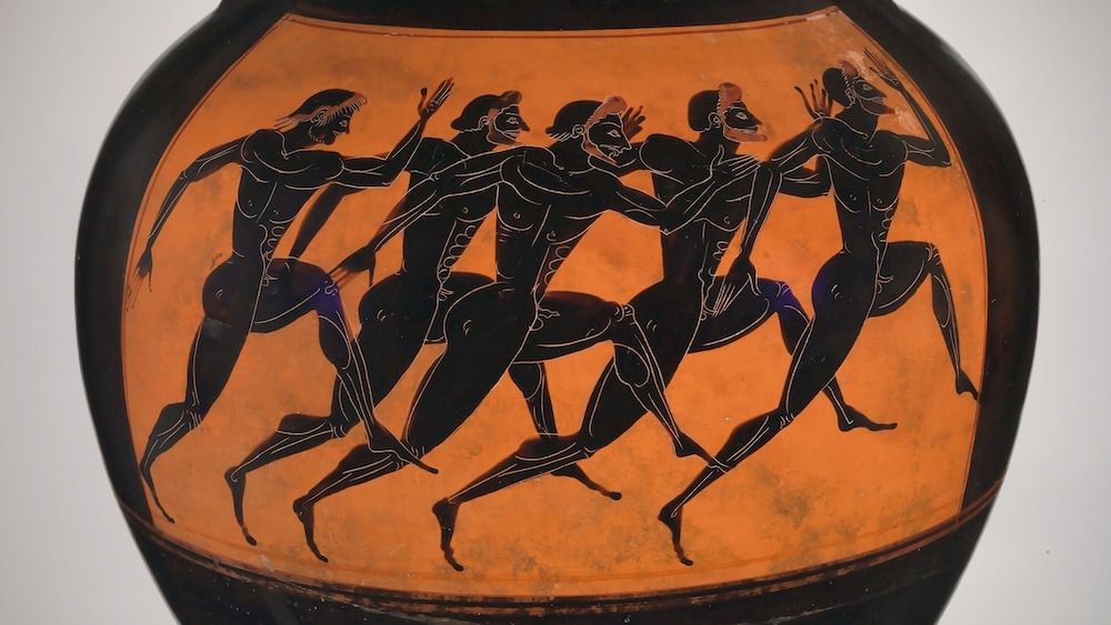 An orange-and-black terracotta pot painted with runners. 