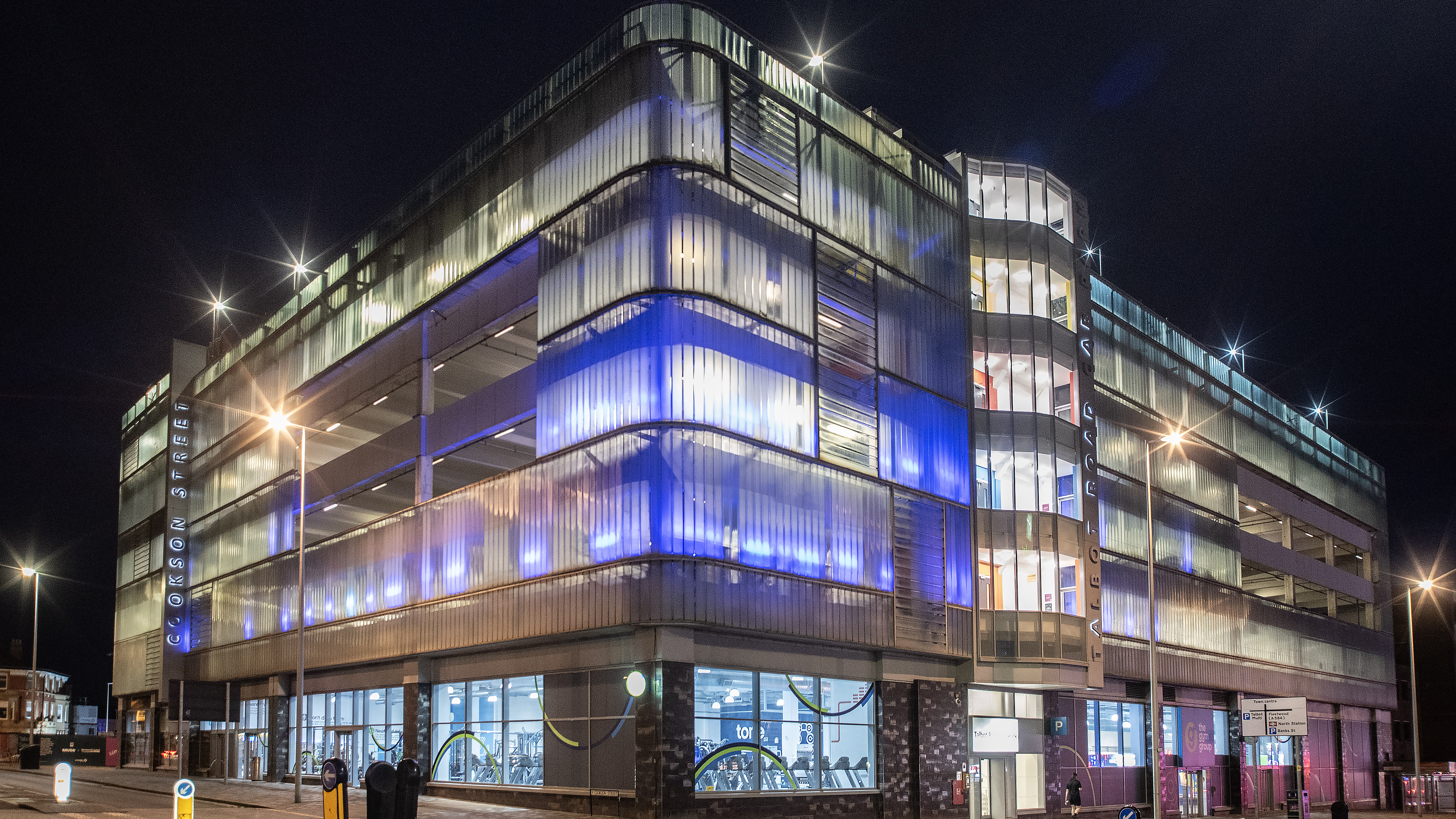 A car park above a gym was lit up at night