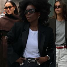 how to wear a statement belt is shown in a collage of street style images 