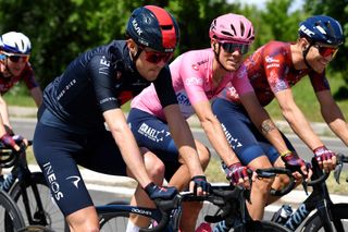 Pavel Sivakov (Ineos Grenadiers) rides next to maglia rosa Alessandro de Marchi on stage 5 before his crash