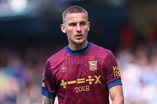 Ipswich squad for 2024/25 MANCHESTER, ENGLAND - AUGUST 24: Luke Woolfenden of Ipswich Town during the Premier League match between Manchester City FC and Ipswich Town FC at Etihad Stadium on August 24, 2024 in Manchester, England. (Photo by Robbie Jay Barratt - AMA/Getty Images)