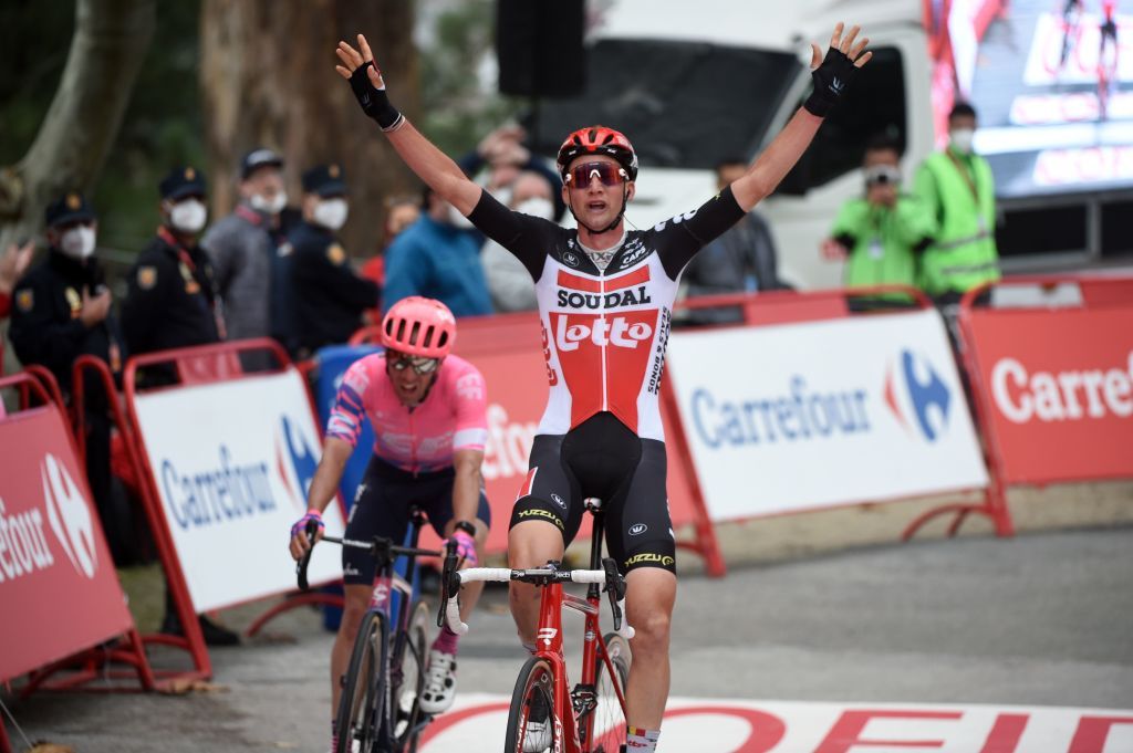 Team Lotto rider Belgiums Tim Wellens celebrates as he crosses the finish line of the 14th stage of the 2020 La Vuelta cycling tour of Spain a 2047km race from Lugo to Ourense on November 4 2020 Photo by MIGUEL RIOPA AFP Photo by MIGUEL RIOPAAFP via Getty Images