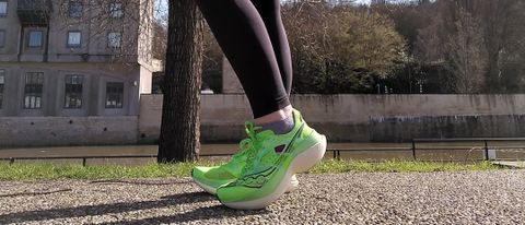 Woman wearing Saucony Endorphin Elite running shoes