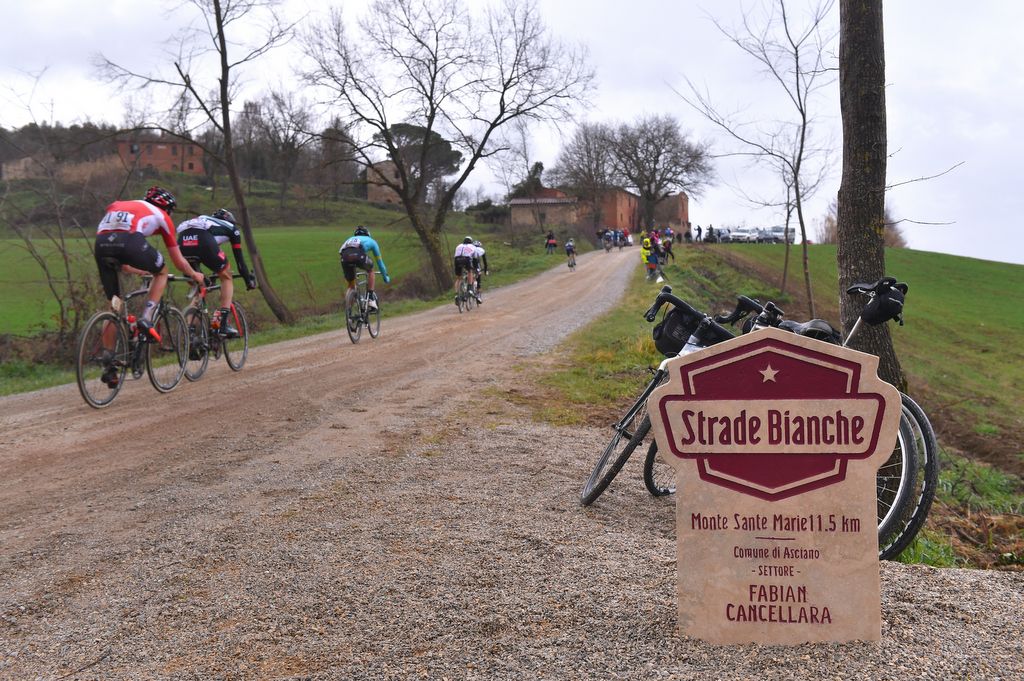 The race heads past the Fabian Cancellara Strade Bianche milestone
