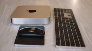 The Apple Mac Mini (M2) with keyboard and mouse