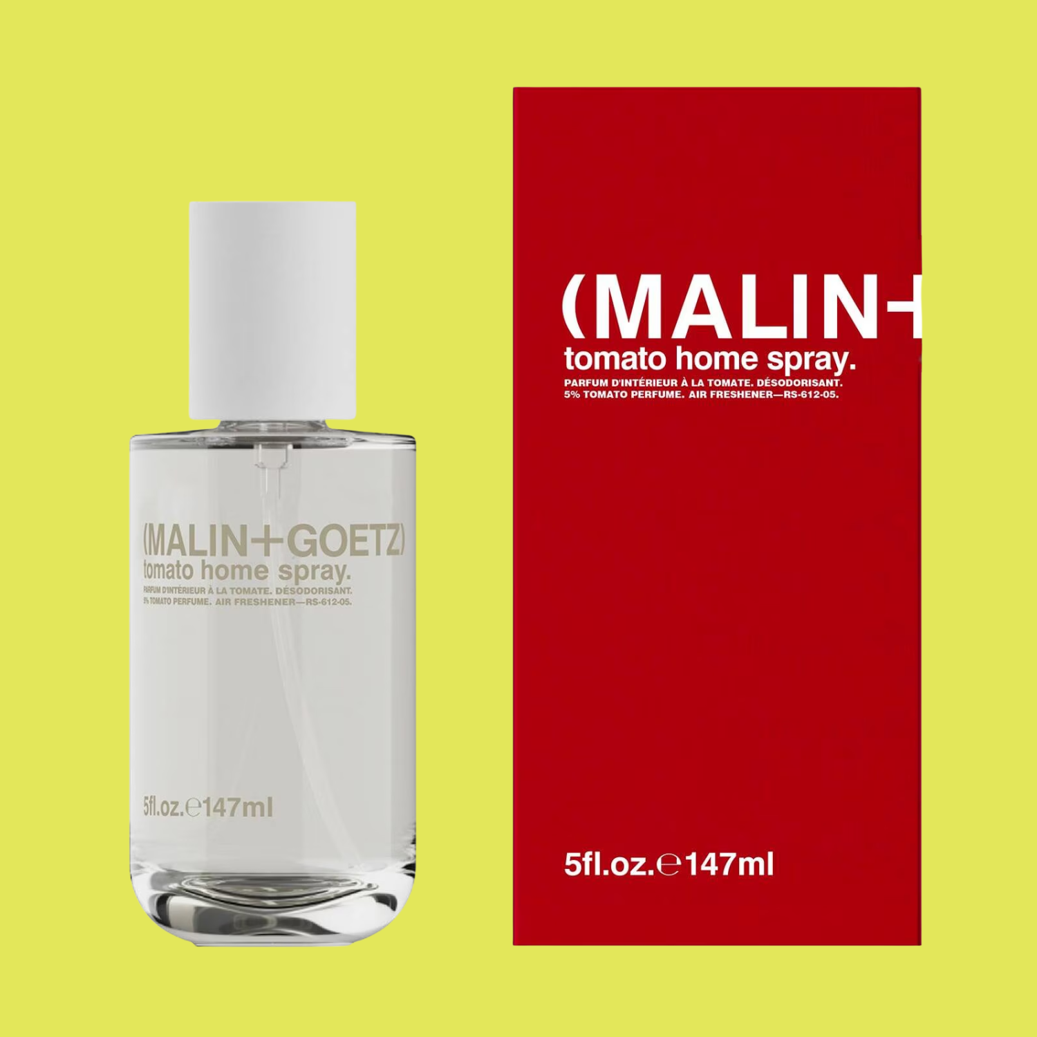 A bottle of tomato room spray by a red box